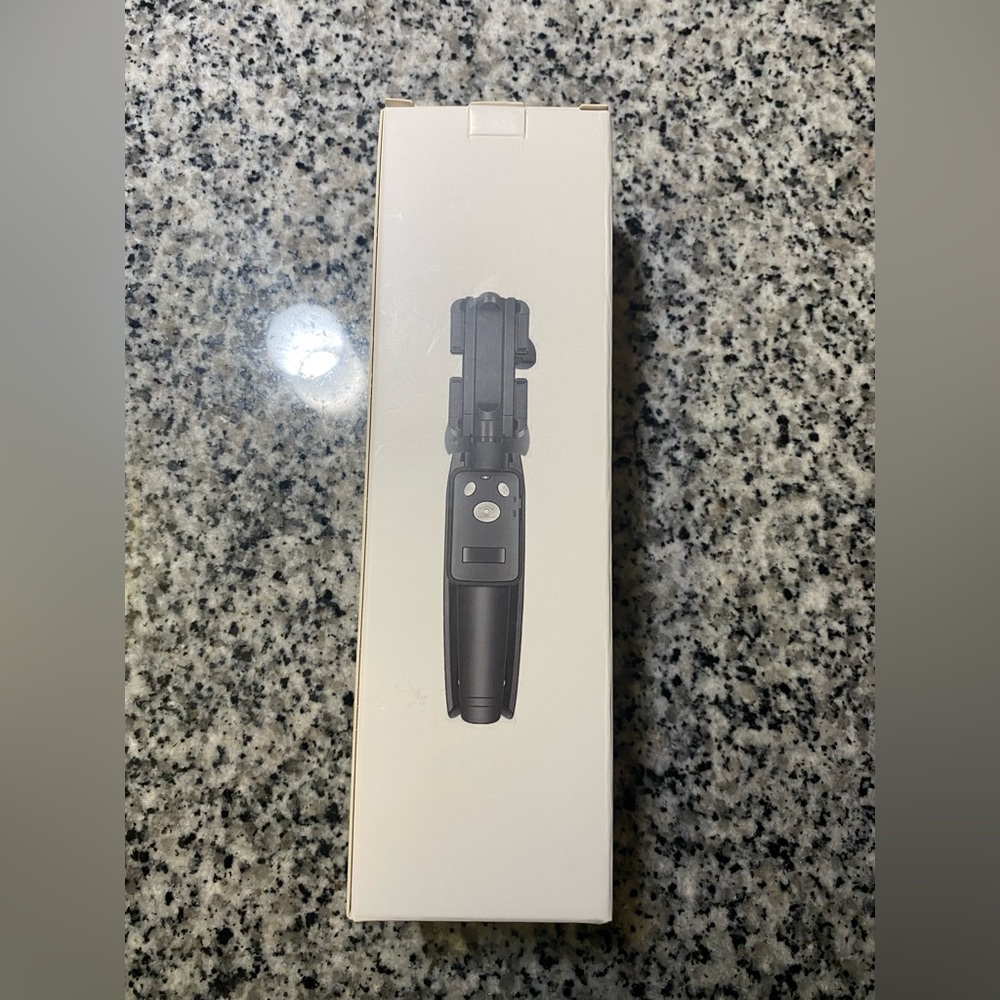 Selfie stick, never opened